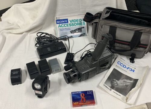 Sony Handycam Video 8 CCD-F34 AS IS PARTS ONLY 4 batteries, charger, bag, books - $25.39