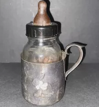 Antique Baby Bottle with warmer Evenflo Brand - $30.00
