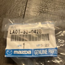 Wheel Hub Axle Nut - Genuine Mazda LA01-33-042B - $9.50