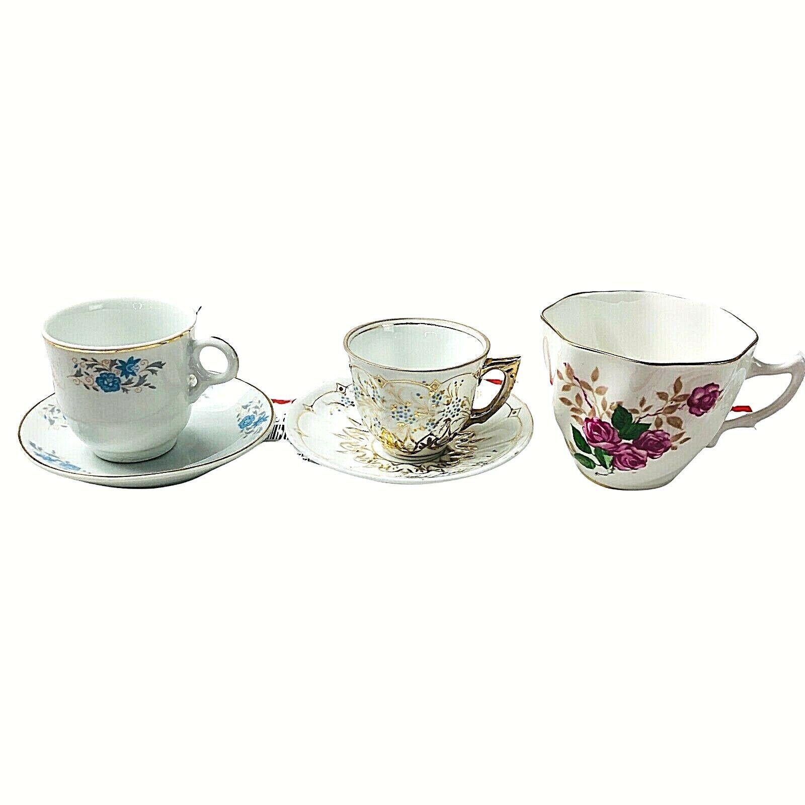 Primary image for Vintage 3 Tea Cups  And 2 Saucers Gold Trim Unbranded 2 Small 1 Medium Floral