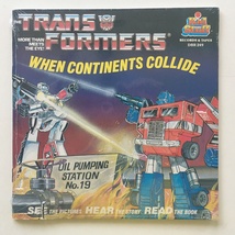 The Transformers: When Continents Collide SEALED 7&#39; Vinyl Record / 24 Page Book - £51.89 GBP