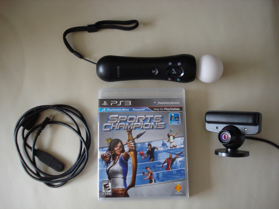 PLAYSTATION 3 MOVE SPORTS CHAMPIONS BUNDLE MOTION CONTROLLER AND EYE CAMERA - $49.99