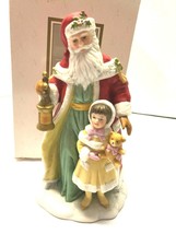 AVON Porcelain Santa With Child 1995 7 1/2&quot; Figurine Figure - $19.80