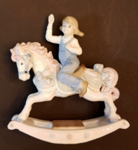Young Girl on Rocking Horse Figurine 8&quot; tall Beautiful Porcelain Paul Sebastian - £12.64 GBP