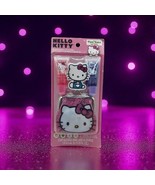 Hello Kitty plant based lip gloss with change purse . New Factory Sealed - $277.41 MXN