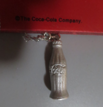 Coca-Cola SIGN 1 BOTTLE DANGLE ORNAMENT - HAD 3  - SOME GLITTERS OFF  AS IS - $0.99
