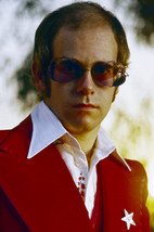 Elton John in classic sunglasses red jacket 24x18 Poster - £19.13 GBP