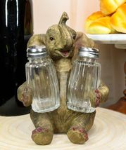Sitting African Safari Bush Elephant With Trunk Up Salt Pepper Shakers H... - $25.99