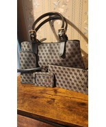 Dooney bourke handbag with matching accessories.  - $123.75
