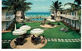 Vintage Sea Breeze Motel Miami Florida Postcard people grass patio pool - £3.86 GBP