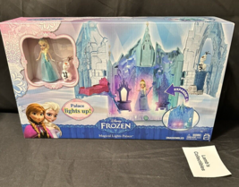 Disney Frozen Magical Lights Palace play set with Elsa and Olaf figures  - $121.24