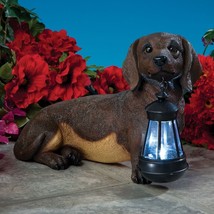 Realistic Dachshund Dog Puppy Garden Sculpture Holding Solar LED Lighted... - $53.94