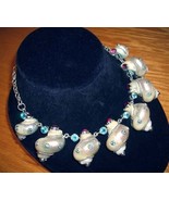 FINE NECKLACE 8 TURBO SHELLS WITH APATITE TOURMALINE AND PER - $12,000.00