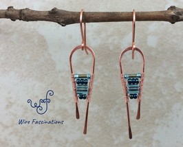 Handmade copper earrings: long curves with metallic blue glass rectangle beads - £21.12 GBP