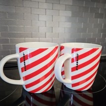 Two Starbucks Coffee Cup Mugs Candy Cane Red White Stripe 12 oz  - $34.65