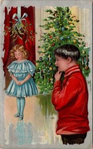 Christmas Greetings Boy Sees Girl Under Mistletoe Decorated Tree Postcard Y20 - £7.04 GBP