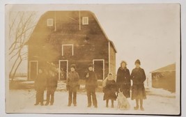 RPPC Seven Children Family Dog Winter Scene at Large Barn Photo Postcard J30 - £6.25 GBP