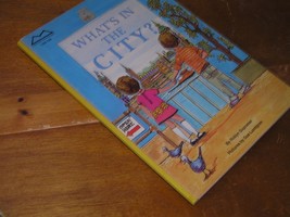 WHAT’S IN THE CITY? By Robyn Supraner illustrated by Sue Lundgren A Nutm... - £6.14 GBP