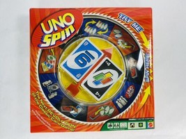 Complete UNO Spin Next Revolution Board Game 2005 Mattel Party Card Game - $28.99