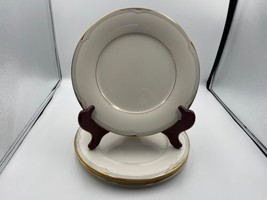 An item in the Pottery & Glass category: Noritake Fine China GOLDEN COVE Dinner Plates Japan Set of 4