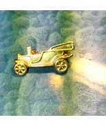Silver car lapel pin - $203.16 MXN