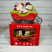 Santa &amp; Snowman Salt &amp; Pepper Shaker Set In Sleigh Christmas Decor NOS Sealed - $18.69