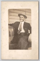 RPPC Gentleman On Porch Swing With Big Smile Postcard U28 - $8.95