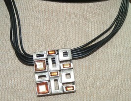Rhinestone pendant necklace 17-20&quot; on black cord unmarked possibly pewte... - $9.89