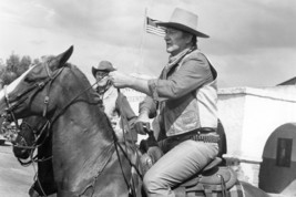 John Wayne 24x18 Poster Riding Horse With American Flag Waving Behind - £19.13 GBP