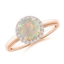 Authenticity Guarantee

ANGARA 0.87 Ct Round Opal Cathedral Ring with Diamond... - £818.16 GBP