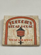 Vintage Matchbook Cover   Freddie’s Steak House  Orlando,  Fl  gmg  unstruck - £9.69 GBP