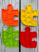 4 Piece Puzzle Jigsaw Shape Pop Sensory Toy - £11.18 GBP