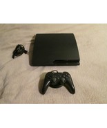 Playstation 3 PS3 Slim 1TB With Games Plus Accessoires - $244.00