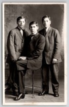 Three Handsome Young Men Brothers RPPC Studio Photo Postcard C23 - £7.15 GBP