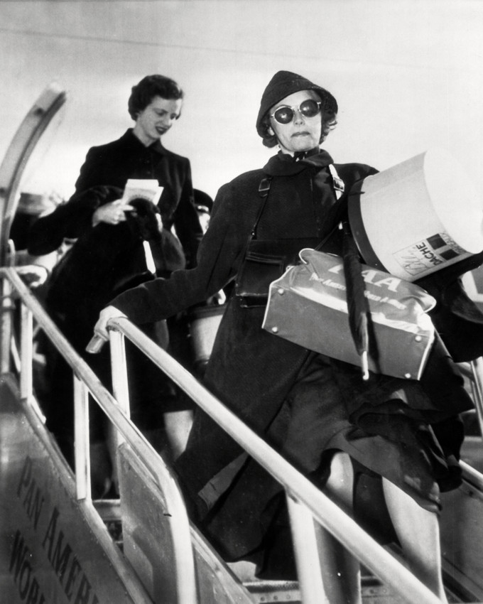 Primary image for Greta Garbo Climbing Down Aircraft Steps 1960's 16x20 Canvas