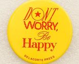 Vintage Library Metal Pinback Button Don't Worry Be Happy Delacorte Press - $9.89
