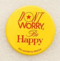 Vintage Library Metal Pinback Button Don't Worry Be Happy Delacorte Press - $9.89