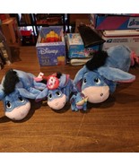 Eeyore plush bundle, plus 1 pvc figure.  Squeeze tummy tail spin, lot of 4 - $23.56