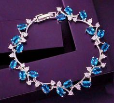 8Ct Simulated Oval Cut Blue Topaz Tennis Bracelet Gold Plated 925 Silver - £155.74 GBP
