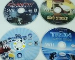 Nintendo Wii Games Lot of 4 Bundle Tron Dino Strike Astroboy Smurfs 2  - $22.76