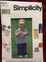 Simplicity 7994 Size 2 3 4 Toddlers&#39; Shirt Top Pants Shorts Cap uncut - $219.69 MXN
