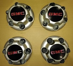 9EE49 CENTER CAPS FROM GMC SIERRA, DUSTY, GOOD CONDITION - $28.04