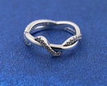  925 Sterling Silver Sparkling Intertwined Wave Ring - $18.00