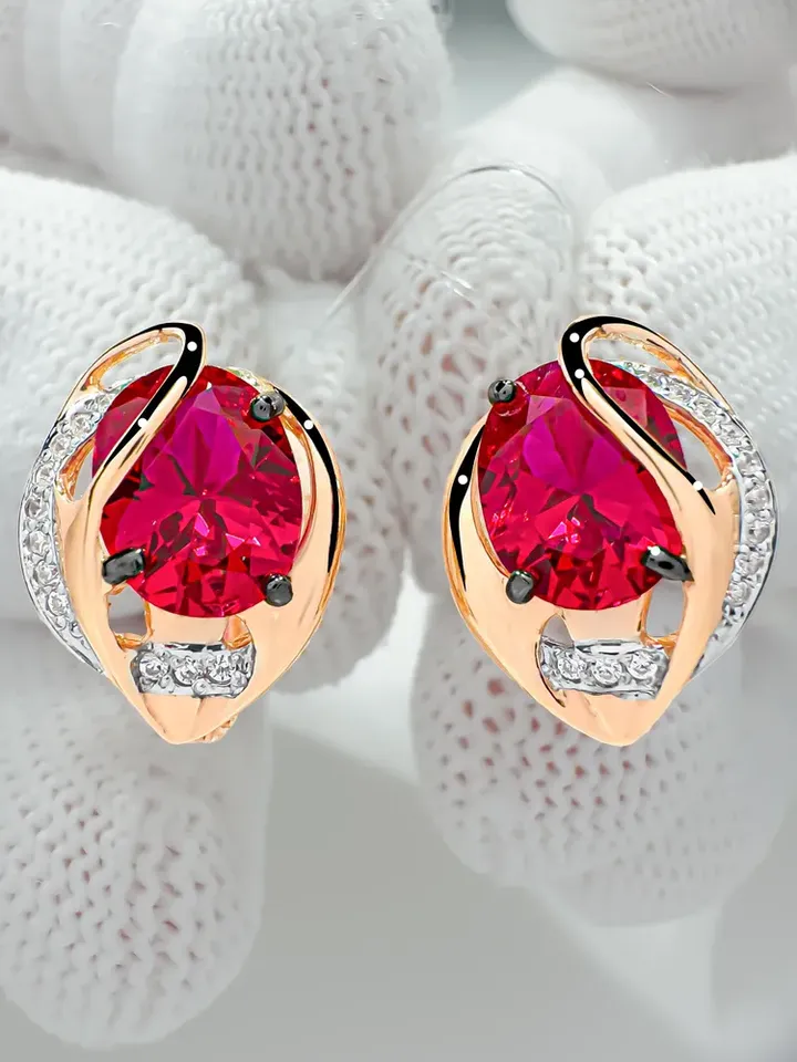 Earrings made of 925 silver (585 gold plated) with corundum and ruby - $125.00