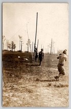 RPPC Soldiers Setting Telephone Poles Real Photo Postcard Q27 - $15.95