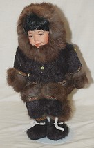 Genuine Porcelain Native Eskimo Doll Dressed Fur Beaded Accents with Stand - $59.39