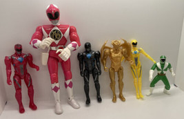 Lot of various Power Ranger figures one is 1993 Bandai pink power ranger - $18.23