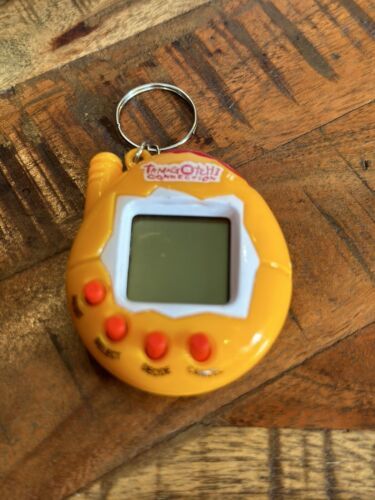 Tamagotchi Vintage Connection  Orange 4 Button Works Batteries Included - $24.70