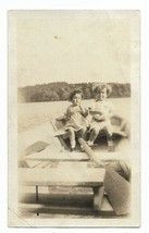 1926 4.5 x 2.75 inch photograph of two young girls in a rowboat on a lake - £15.70 GBP