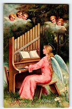 Christmas Postcard Seated Winged Angel Plays Piano Cherubs Watching 1912... - $91.68